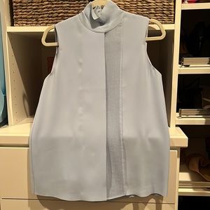 Light blue sleeveless blouse by Vince